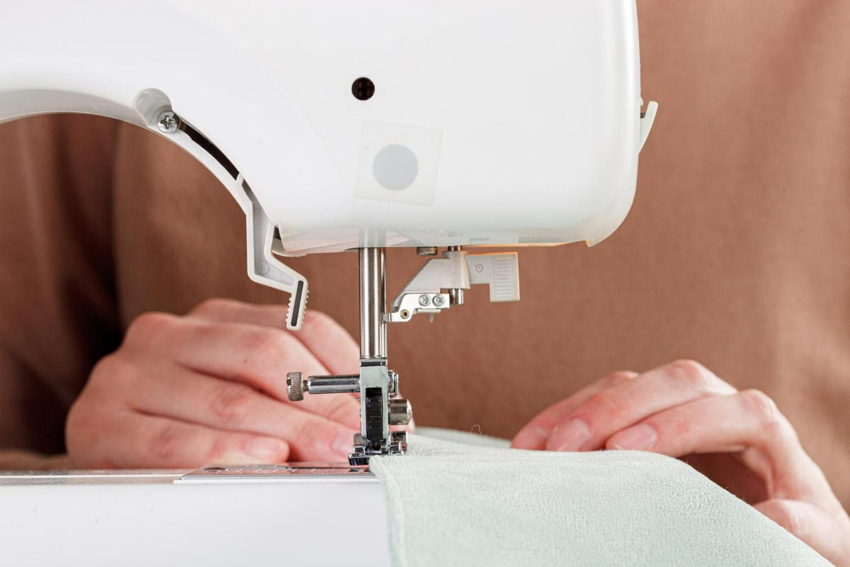 Back stitch sewn by hand along a fabric seam